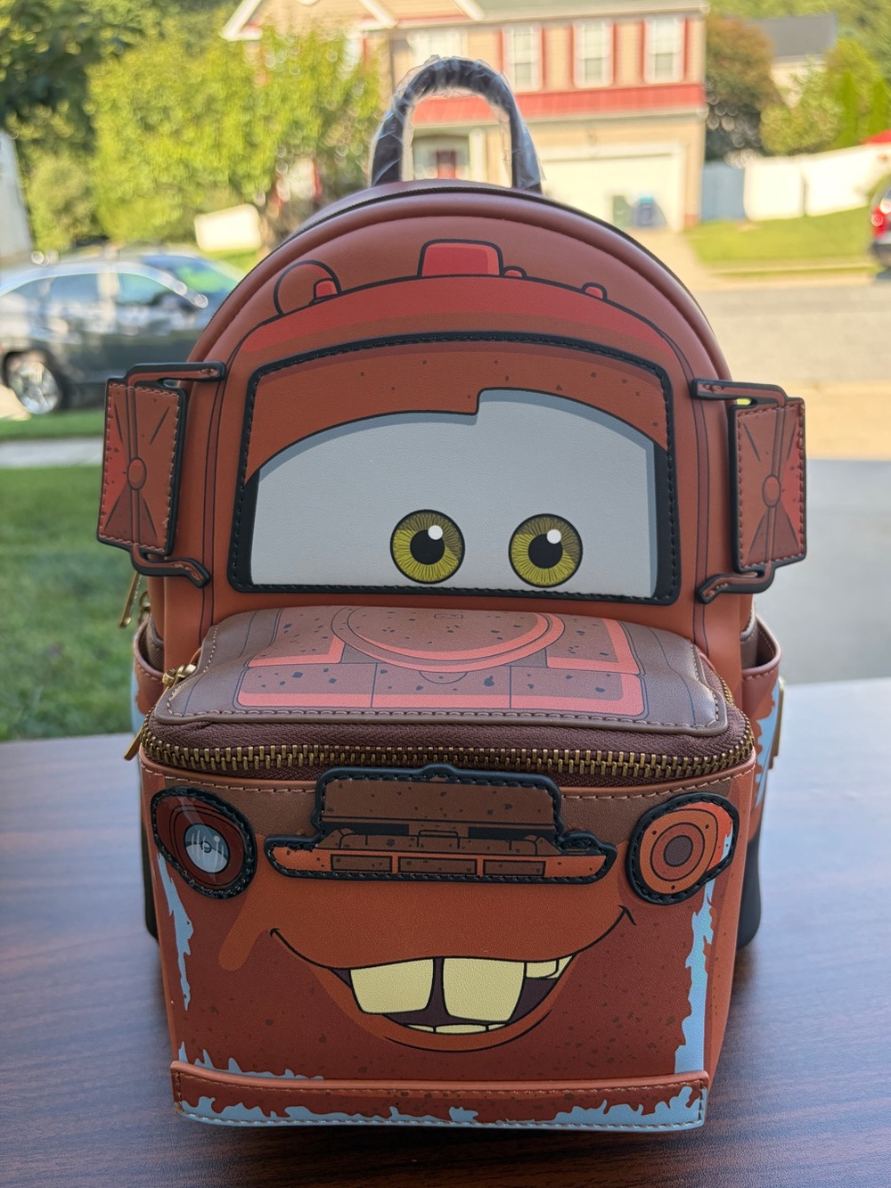 Loungefly Disney Pixar Cars Tow Mater Light-Up Mini Backpack NWT